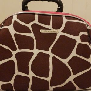 Pink and brown zebra carry on